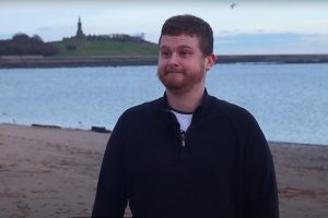 Former smoker Danny Patterson standing on the beach at North Shields Fish Quay.